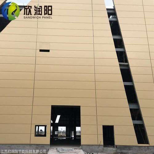 新型节能保温金属幕墙板的创新与应用——浙江聚氨酯封边岩棉复合一体板解析